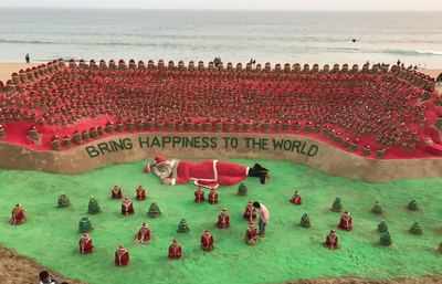 Thousands of sand Santa Clauses at Puri beach!