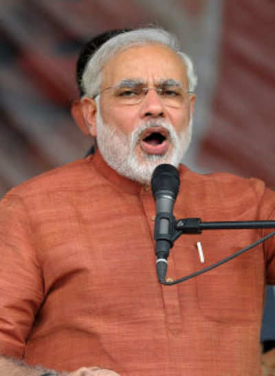 Modi mocks PM at NRI meet, hints at 'better times' after polls