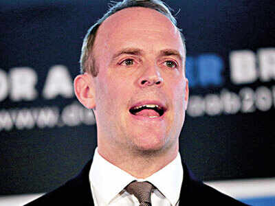 Out of UK PM race, Raab backs Boris