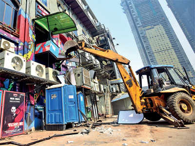 Demolition teams target 314 places, NYE business hit