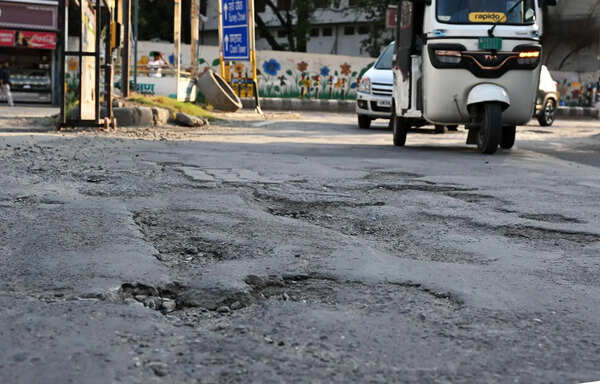 Nowhere to walk: Pedestrians wade through traffic on Sahastradhara Road