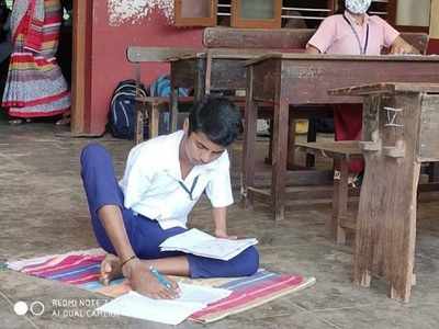 SSLC student scores first class by writing with his leg