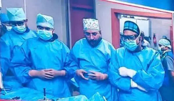 Laser sys to remove cardiac blockages