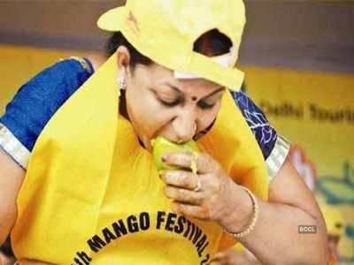 Women's mango eating competition at Nandi Hills