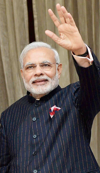 Modi’s monogrammed suit in Guinness Book