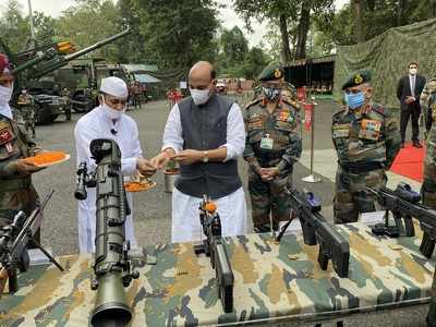 Rajnath Singh performs 'Shastra Puja', says Army won't let anyone take an inch of country's land