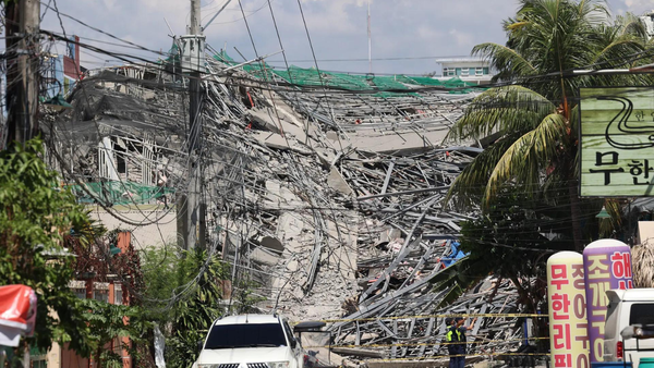 A 9-story building under construction in Philippines collapses, possibly trapping dozens of workers