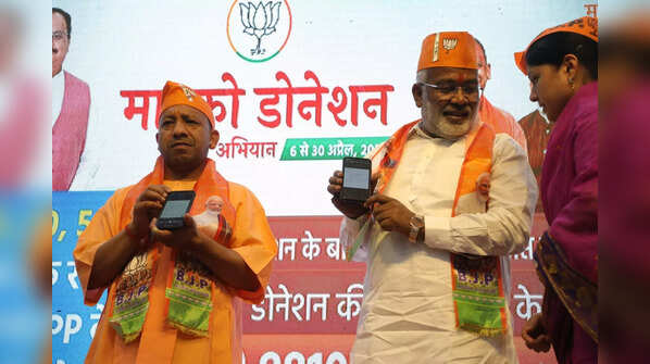 In pics: CM Yogi hoists party flag on BJP's 42nd foundation day