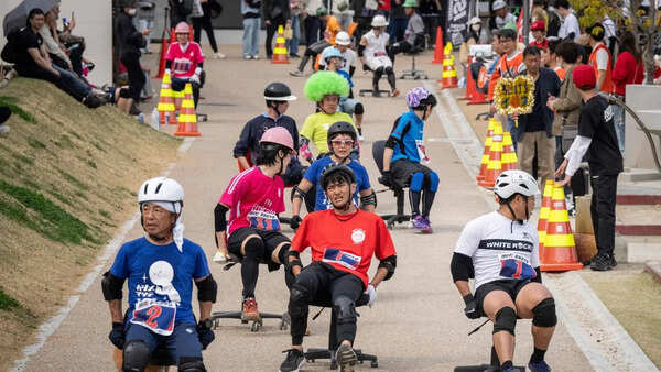 Chair racing! Japan beats office boredom on wheels