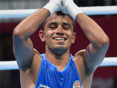 Asian Games 2018: Amit Panghal beats Olympic Champion Hasanboy Dusmatov  to win light-flyweight gold