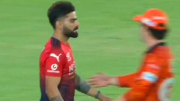 No handshake! Virat Kohli completely ignores Travis Head after RCB vs SRH IPL 2026 game - Watch