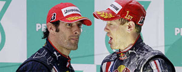 Vettel gets Red Bull's first race win and 1-2!