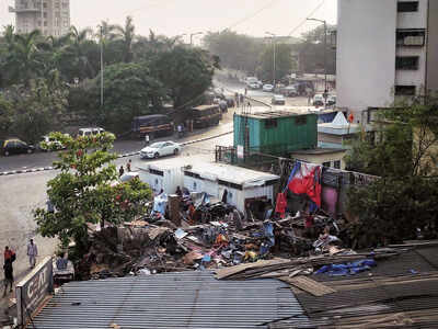 Major junction cleared as BMC razes 37 huts, will reduce travel time from Annie Besant Road to Worli sea face