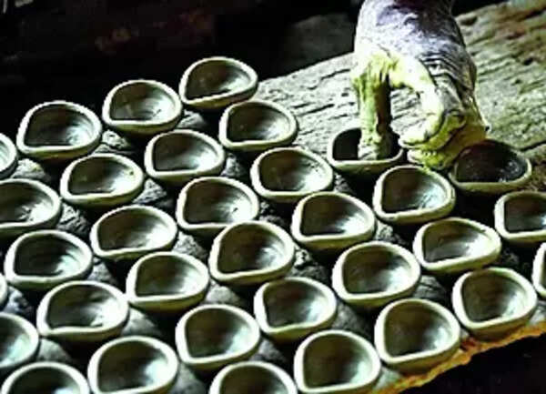 Lights mask glow of earthen lamps