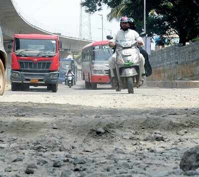 In Pics: Bengaluru's becoming synonymous with potholes