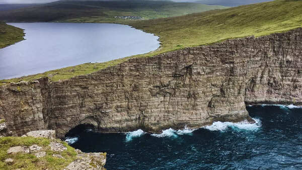 There's a lake located above an ocean, can you  take a guess?