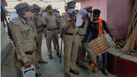 Lucknow: Cops do 'munadi' outside banished gangsters' homes 