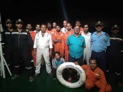 Coast Guard rescues 13 crew members of dredger trapped in high waves