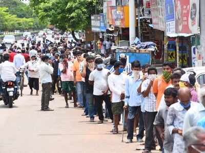 Booze lovers cheer as liquor stores open in Andhra Pradesh