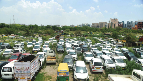 Noida’s ‘carbage’ nightmare: Parks, medians and police compounds buried under mountains of abandoned vehicles
