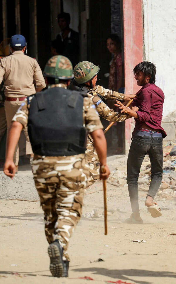 396 arrested, charged with rioting over violent labour protest in Noida