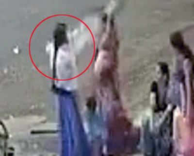 Woman cop thrashes senior citizen at temple