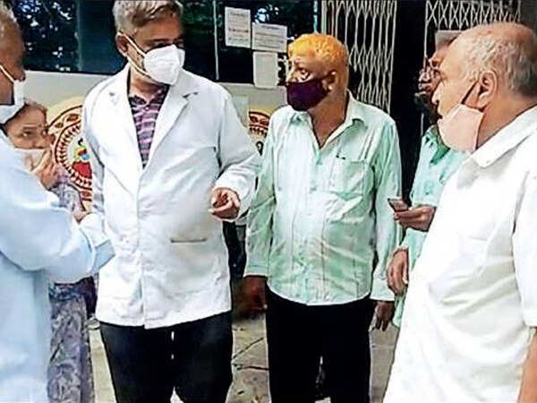 Bengaluru: Elders trade words with health staff