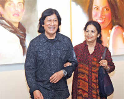 Laxman Shrestha with wife at an art opening
