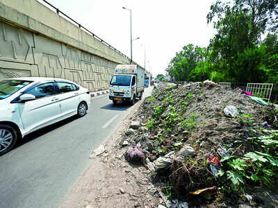 HBR Layout service road: Dumped upon, damaged, disturbed