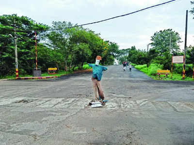 Scarecrow on guard: Call for culvert repairs