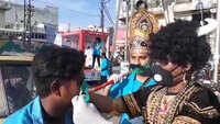 Covid-19: Dressed as Yamraj and Chitragupt, activists distribute face masks to public in Bhopal 