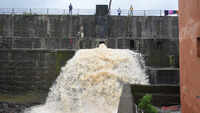 Katraj Lake overflows, people clean their houses after heavy downpour in Pune 