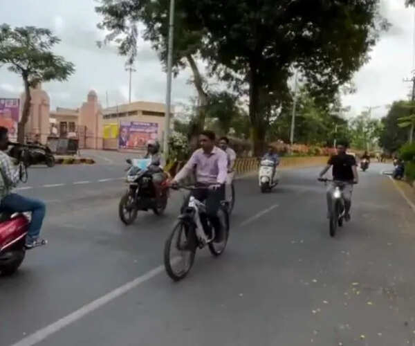 NTR district collector rides battery cycle to promote green mobility