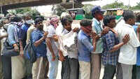 People flout social distancing norms during food distribution in Vijayawada 