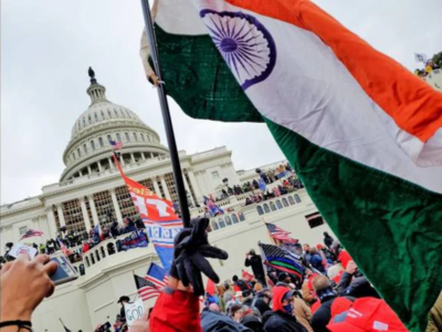 US Capitol Violence: Complaint filed against Indian national for waving tricolour during protest