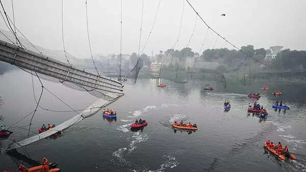 How a festive stroll over a historic bridge turned to carnage in India