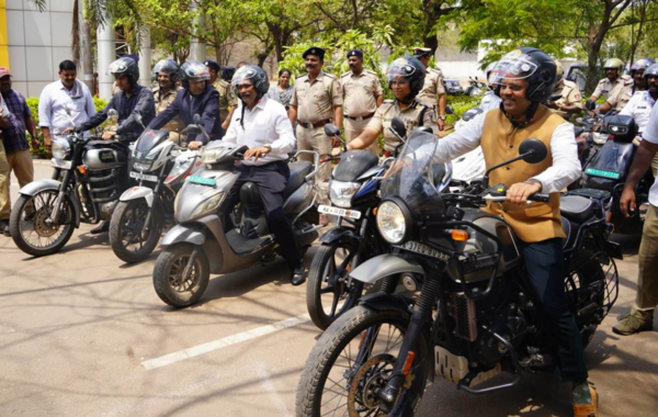 Ballari DC rides bike to promote helmet awareness