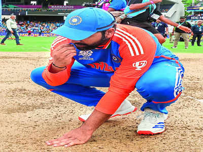 Rohit tastes Barbados pitch soil after emotional win