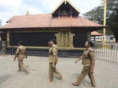Devotees throng Sabarimala temple as shrine opens amid controversy