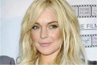 Lindsay Lohan wants money, pics with Putin for interview about ex Egor
