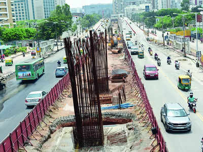 Bengaluru: In a first, BMRCL moots walk-way below elevated Metro line on  ORR | Bengaluru News - Times of India