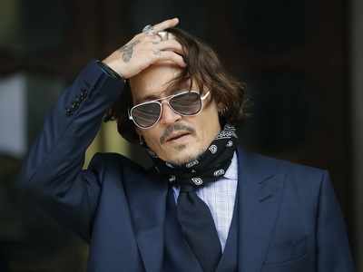 Johnny Depp loses UK libel case over wife-beater story