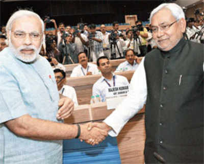 Modi hits Congress and Nitish for a six