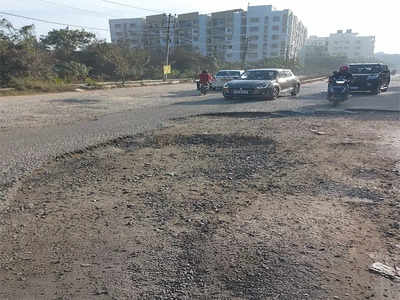 Crater chaos on Belathur Road frustrates motorists