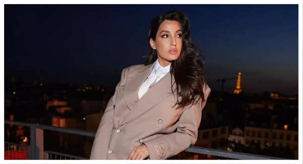 Style with swagger: Women own the suit and tie look