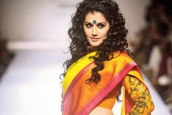Mumbai to Moulin Rouge on the ramp at LFW' 14