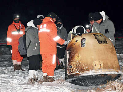 China’s moon probe lands back on Earth