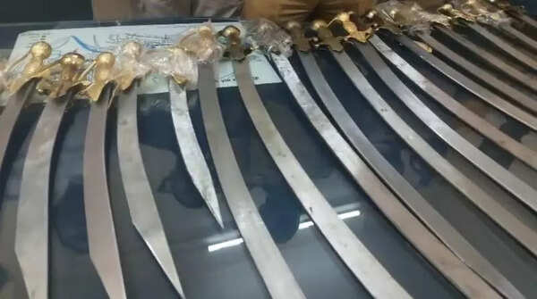 Shopowner held, 21 swords seized