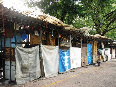 Fashion Street is empty and shopkeepers have to do odd jobs to make a living