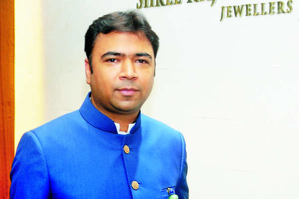 Pradeep and Ashok Goel, directors of Shree Raj Mahal Jewellers host a get-together at their South Ex showroom in Delhi